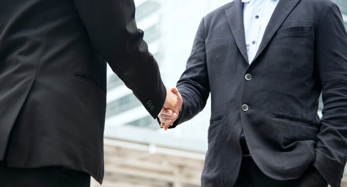 business leaders shaking hands